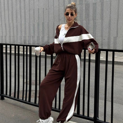 <font dir="auto" style="vertical-align: inherit;"><font dir="auto" style="vertical-align: inherit;">2026 Amazon moda Avrupa ve Amerikan günlük stil spor takım elbise fermuarlı hırka ve uzun pantolon iki parçalı kadın takım</font></font>