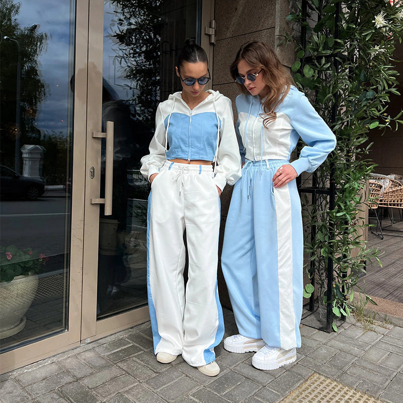 <font dir="auto" style="vertical-align: inherit;"><font dir="auto" style="vertical-align: inherit;">Amazon dış ticaret Avrupa ve Amerikalı kadınların renk bloke eden moda seti seksi beli açığa çıkardığı kapüşonlu renk bloke eden hırka eşofman altı iki par