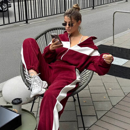 <font dir="auto" style="vertical-align: inherit;"><font dir="auto" style="vertical-align: inherit;">2026 Amazon moda Avrupa ve Amerikan günlük stil spor takım elbise fermuarlı hırka ve uzun pantolon iki parçalı kadın takım</font></font>