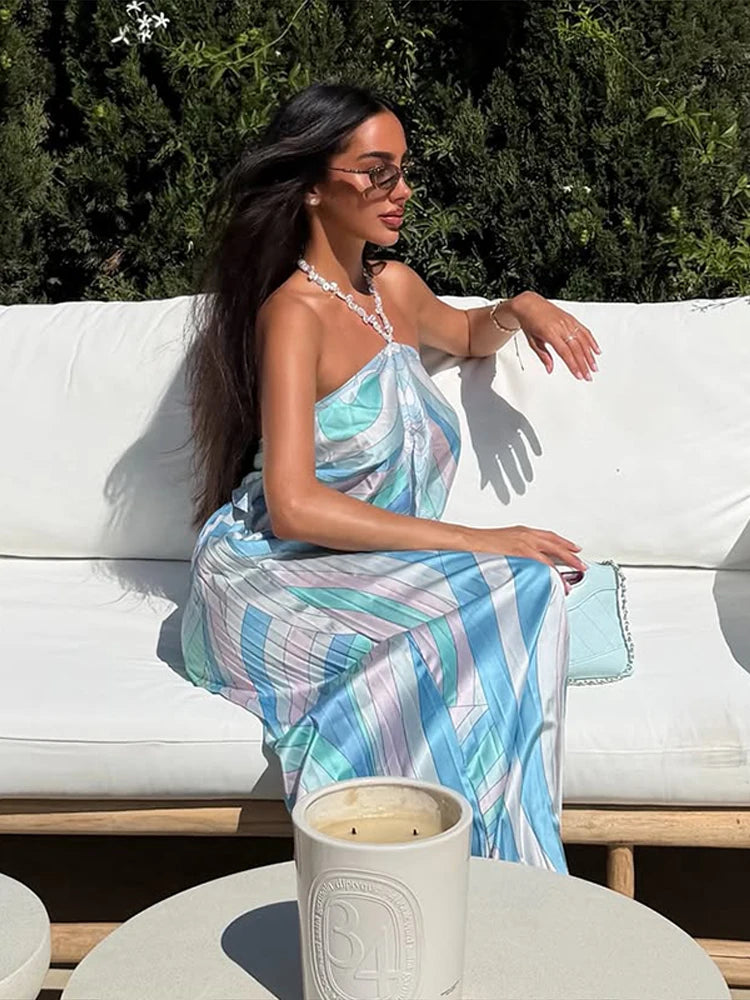 Kadın Pastel Desenli Saten Görünümlü Takım – Boyundan Bağlamalı Halter Bluz ve Geniş Paça Pantolon